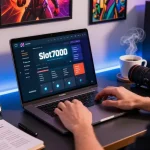 Engaging workspace showcasing Slot7000 app features on laptop surrounded by gaming elements.